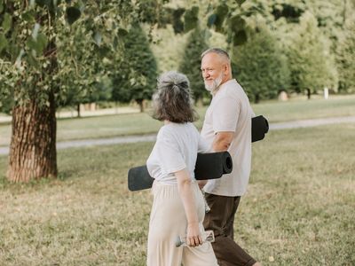Close-up of yoga mat texture and water bottle.